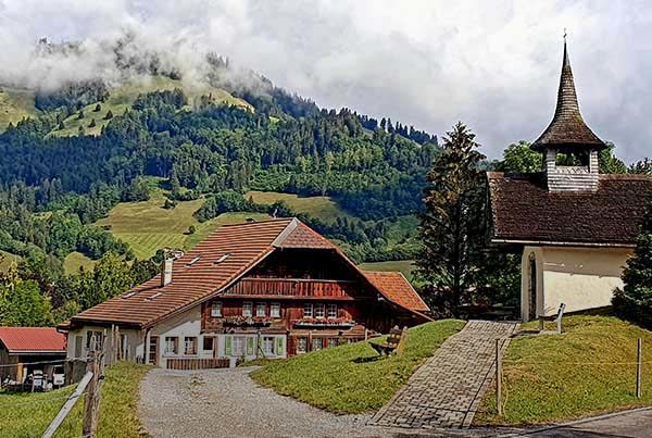 Hiking in Gruyères, Switzerland amongst farmahouses and cow bells.