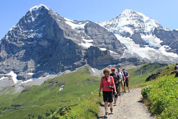 Hiking in the presence of Eiger, Mönch and Jungfrau, above Grindelwald.